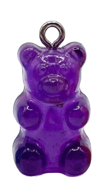 Purple gummy bear charm on a white background